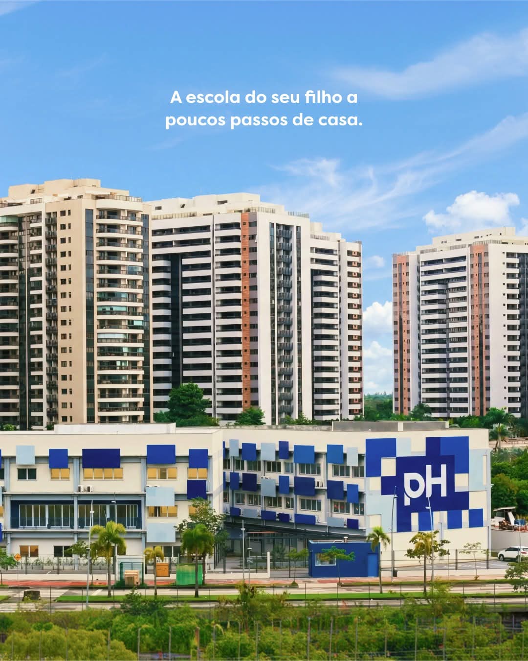 prédio de escola com fachada azul e logo PH no canto, cercado por edifícios residenciais altos sob céu azul —